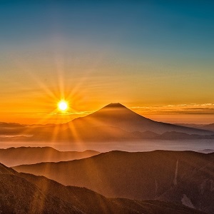 tableau coucher du soleil sur les montagnes